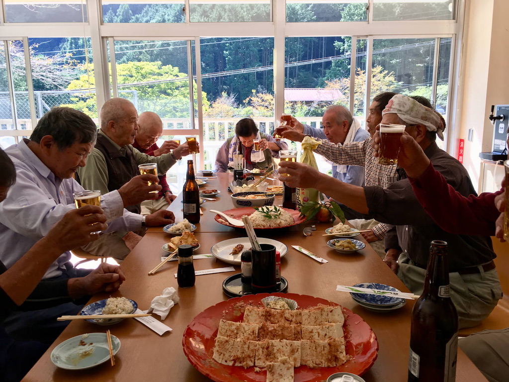 Community members sharing lunch in the Shimonanosato dining hall