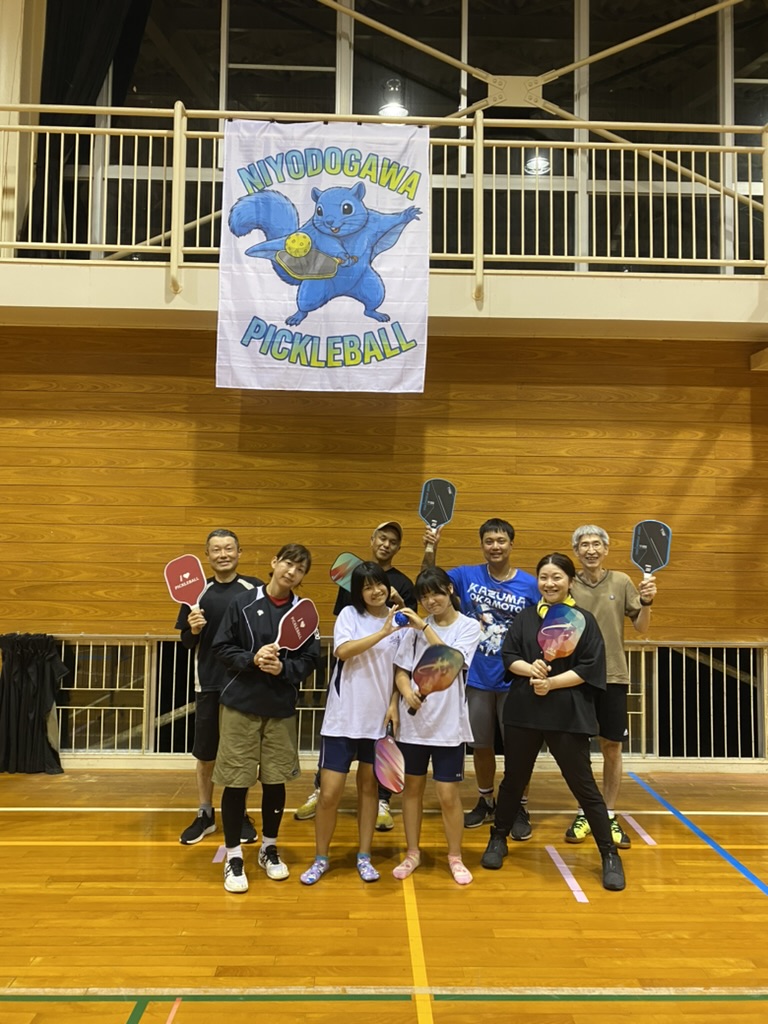 A welcoming group playing pickleball at Shimonanosato