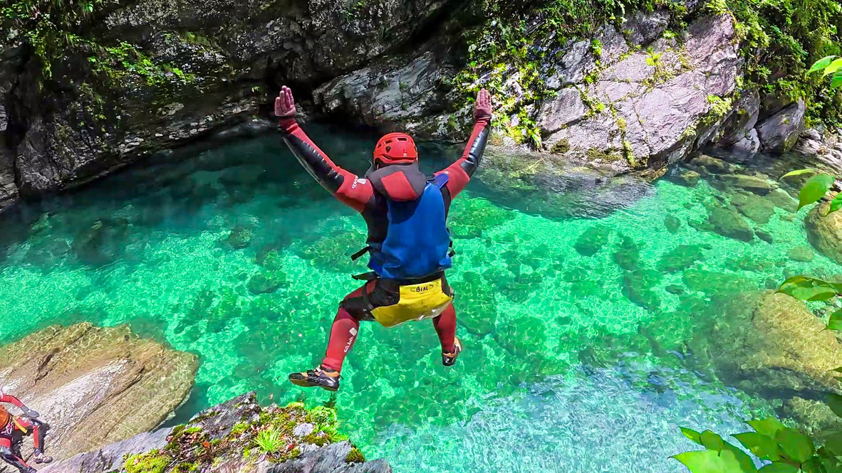 Canyoning in the clear turquoise water of the Nakatsu River near Niyodogawa